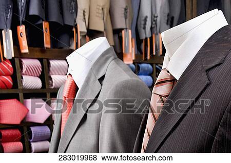 Close-up of mannequins with formal suits in a clothing store View Large Photo Image Stock Photo - Close-up of mannequins with formal suits in a clothing store. Fotosearch