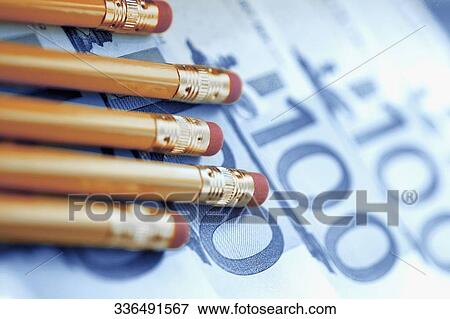 Stock Photo - Close-up of pencils on European union banknotes. Fotosearch