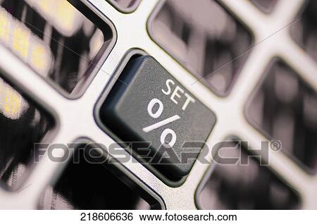 Close-up of percentage sign on a calculator View Large Photo Image Stock Photograph - Close-up of percentage sign on a calculator. Fotosearch