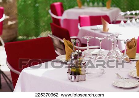 Stock Image - Close-up of place settings on the table. Fotosearch