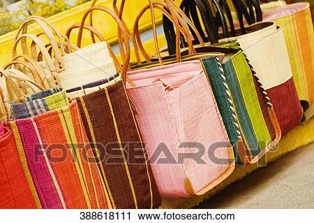 Close-up of shopping bags in a row View Large Photo Image Stock Image - Close-up of shopping bags in a row. Fotosearch