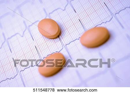 Close-up of tablets on an ECG report View Large Photo Image Stock Photo - Close-up of tablets on an ECG report. Fotosearch