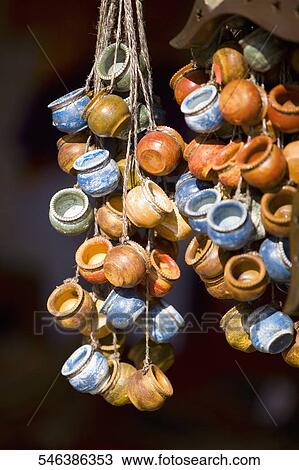 Close-up of teacups hanging at a market stall View Large Photo Image Stock Image - Close-up of teacups hanging at a market stall. Fotosearch
