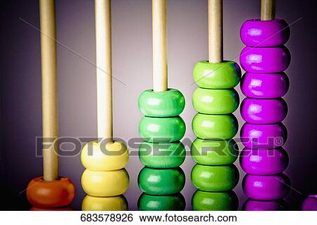 Close-up of the beads of an abacus View Large Photo Image Stock Photograph - Close-up of the beads of an abacus. Fotosearch