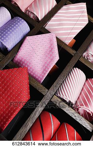 Close-up of ties displayed at a clothing store View Large Photo Image Picture - Close-up of ties displayed at a clothing store. Fotosearch