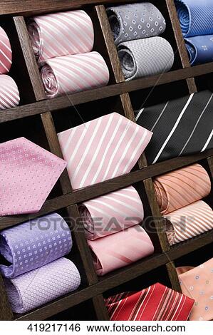 Close-up of ties in a clothing store View Large Photo Image Stock Photograph - Close-up of ties in a clothing store. Fotosearch