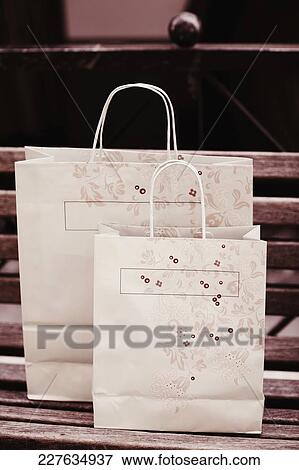 Close-up of two shopping bags View Large Photo Image Stock Photo - Close-up of two shopping bags. Fotosearch