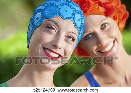 Stock Photo - Close-up of two women smiling, Biltmore Hotel, Coral Gables, Florida, USA. Fotosearch