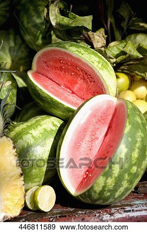 Close-up of watermelons and lemons on a fruit stall at the market View Large Photo Image Stock Photo - Close-up of watermelons and lemons on a fruit stall at the market. Fotosearch