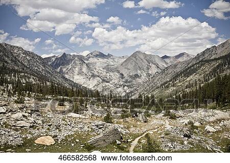 Clouds over a mountain range View Large Photo Image Stock Photo - Clouds over a mountain range. Fotosearch