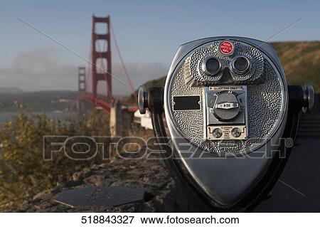 Stock Photo - Coin-operated binoculars with a bridge in the background, Golden Gate Bridge, San Francisco Bay, San Francisco, California, USA. Fotosearch