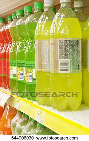 Cold drink bottles in a supermarket View Large Photo Image Stock Image - Cold drink bottles in a supermarket. Fotosearch