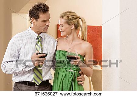 Couple enjoying wine View Large Photo Image Stock Photo - Couple enjoying wine. Fotosearch