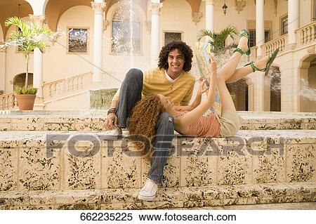 Couple having fun near a fountain, Biltmore Hotel, Coral Gables, Florida, USA View Large Photo Image Stock Photography - Couple having fun near a fountain, Biltmore Hotel, Coral Gables, Florida, USA. Fotosearch