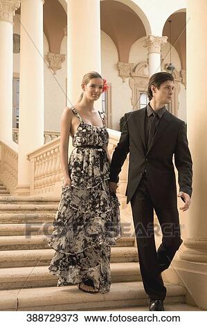 Couple moving down steps, Biltmore Hotel, Coral Gables, Florida, USA View Large Photo Image Stock Image - Couple moving down steps, Biltmore Hotel, Coral Gables, Florida, USA. Fotosearch
