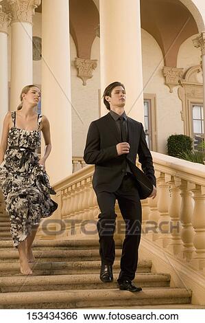 Couple moving down steps, Biltmore Hotel, Coral Gables, Florida, USA View Large Photo Image Stock Photograph - Couple moving down steps, Biltmore Hotel, Coral Gables, Florida, USA. Fotosearch