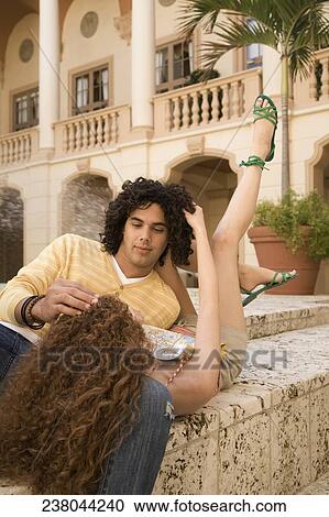 Couple resting near a fountain, Biltmore Hotel, Coral Gables, Florida, USA View Large Photo Image Stock Image - Couple resting near a fountain, Biltmore Hotel, Coral Gables, Florida, USA. Fotosearch