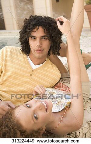 Couple resting near a fountain, Biltmore Hotel, Coral Gables, Florida, USA View Large Photo Image Stock Photo - Couple resting near a fountain, Biltmore Hotel, Coral Gables, Florida, USA. Fotosearch