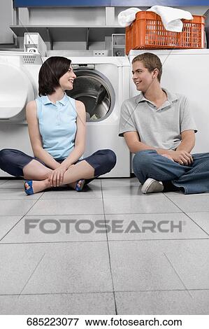 Stock Photo - Couple smiling at each other. Fotosearch