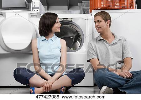 Couple smiling at each other View Large Photo Image Stock Photography - Couple smiling at each other. Fotosearch