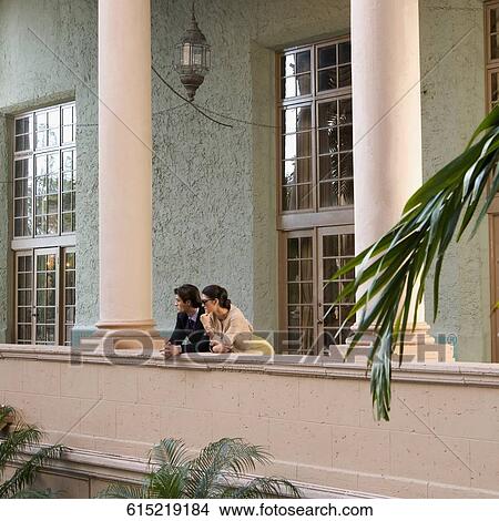 Picture - Couple standing in the balcony, Biltmore Hotel, Coral Gables, Florida, USA. Fotosearch