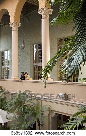 Couple standing in the balcony, Biltmore Hotel, Coral Gables, Florida, USA View Large Photo Image Stock Image - Couple standing in the balcony, Biltmore Hotel, Coral Gables, Florida, USA. Fotosearch