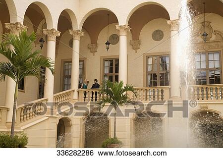 Couple standing in the balcony, Biltmore Hotel, Coral Gables, Florida, USA View Large Photo Image Stock Photograph - Couple standing in the balcony, Biltmore Hotel, Coral Gables, Florida, USA. Fotosearch