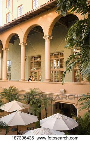 Couple standing in the balcony, Biltmore Hotel, Coral Gables, Florida, USA View Large Photo Image Stock Photography - Couple standing in the balcony, Biltmore Hotel, Coral Gables, Florida, USA. Fotosearch