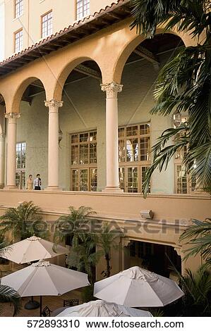 Couple walking in the balcony, Biltmore Hotel, Coral Gables, Florida, USA View Large Photo Image Stock Image - Couple walking in the balcony, Biltmore Hotel, Coral Gables, Florida, USA. Fotosearch