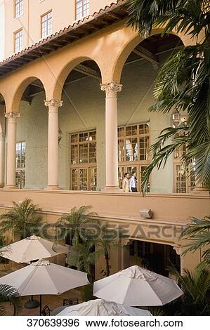 Couple walking in the balcony, Biltmore Hotel, Coral Gables, Florida, USA View Large Photo Image Stock Photograph - Couple walking in the balcony, Biltmore Hotel, Coral Gables, Florida, USA. Fotosearch