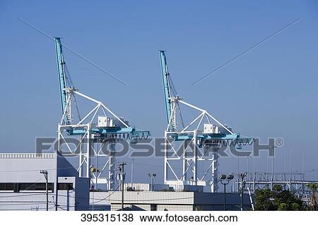 Cranes at a commercial dock, Port Of Miami, Miami Beach, Florida, USA View Large Photo Image Stock Photo - Cranes at a commercial dock, Port Of Miami, Miami Beach, Florida, USA. Fotosearch