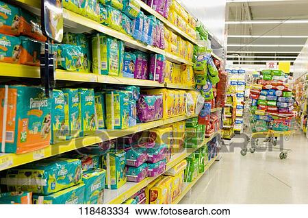 Picture - Diapers on racks in a supermarket. Fotosearch