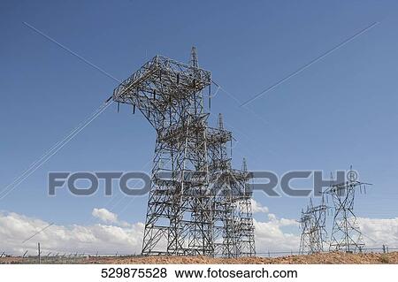 Electricity pylons in a field, Glen Canyon Dam, Lake Powell, Colorado River, Page, Arizona, USA View Large Photo Image Stock Photo - Electricity pylons in a field, Glen Canyon Dam, Lake Powell, Colorado River, Page, Arizona, USA. Fotosearch