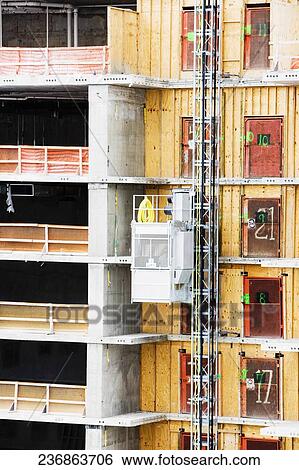 Stock Photograph - Elevator at a construction site. Fotosearch