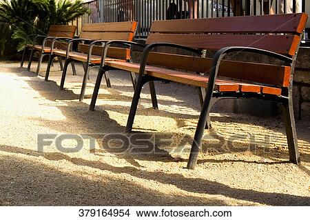 Empty benches in a row, Barcelona, Spain View Large Photo Image Picture - Empty benches in a row, Barcelona, Spain. Fotosearch