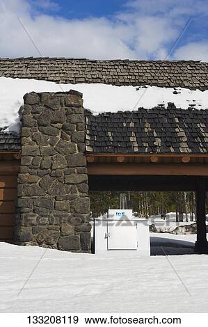 Entrance of a hotel, Old Faithful, Yellowstone National Park, Wyoming, USA View Large Photo Image Stock Photo - Entrance of a hotel, Old Faithful, Yellowstone National Park, Wyoming, USA. Fotosearch