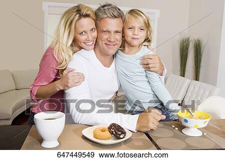 Family having breakfast View Large Photo Image Stock Photo - Family having breakfast. Fotosearch