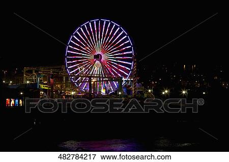 Ferris wheel in an amusement park, Santa Monica Pier, Santa Monica, Los Angeles County, California, USA View Large Photo Image Stock Photo - Ferris wheel in an amusement park, Santa Monica Pier, Santa Monica, Los Angeles County, California, USA. Fotosearch