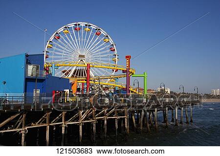 Stock Image - Ferris wheel on a pier, Santa Monica Pier, Santa Monica, Los Angeles County, California, USA. Fotosearch