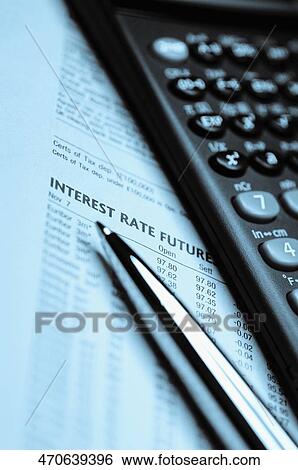 Financial calculator and a pen on a financial newspaper View Large Photo Image Stock Photograph - Financial calculator and a pen on a financial newspaper. Fotosearch