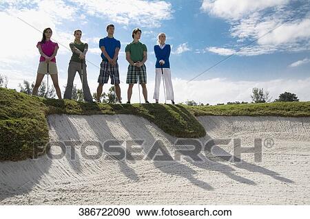 Five friends standing in a golf course, Biltmore Golf Course, Coral Gables, Florida, USA View Large Photo Image Stock Image - Five friends standing in a golf course, Biltmore Golf Course, Coral Gables, Florida, USA. Fotosearch