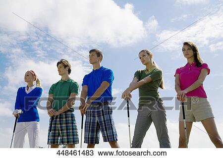 Five friends standing in a golf course, Biltmore Golf Course, Coral Gables, Florida, USA View Large Photo Image Stock Image - Five friends standing in a golf course, Biltmore Golf Course, Coral Gables, Florida, USA. Fotosearch