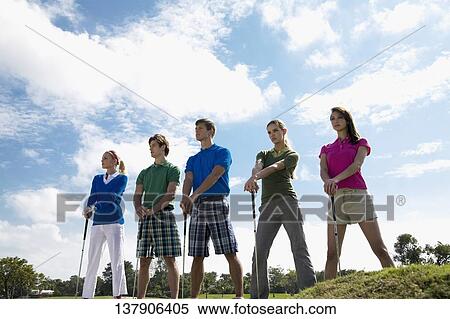 Five friends standing in a golf course, Biltmore Golf Course, Coral Gables, Florida, USA View Large Photo Image Stock Photography - Five friends standing in a golf course, Biltmore Golf Course, Coral Gables, Florida, USA. Fotosearch