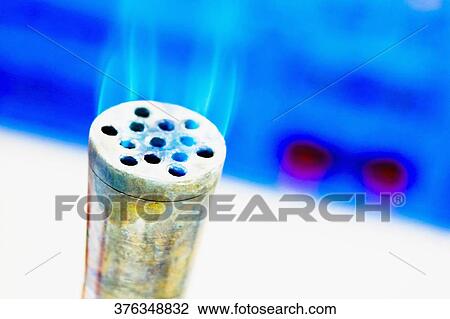 Flame emerging from a metallic cylinder View Large Photo Image Stock Image - Flame emerging from a metallic cylinder. Fotosearch