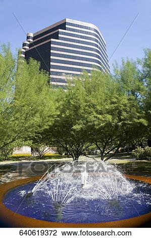 Fountain with an office building in the background, Phoenix, Maricopa County, Arizona, USA View Large Photo Image Stock Image - Fountain with an office building in the background, Phoenix, Maricopa County, Arizona, USA. Fotosearch