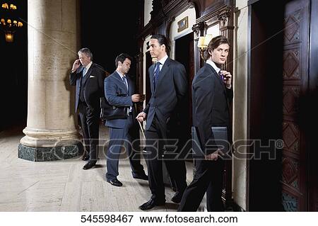 Four businessmen standing in a hotel lobby, Biltmore Hotel, Coral Gables, Florida, USA View Large Photo Image Stock Photo - Four businessmen standing in a hotel lobby, Biltmore Hotel, Coral Gables, Florida, USA. Fotosearch