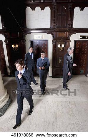Four businessmen walking in a hotel lobby, Biltmore Hotel, Coral Gables, Florida, USA View Large Photo Image Stock Photograph - Four businessmen walking in a hotel lobby, Biltmore Hotel, Coral Gables, Florida, USA. Fotosearch
