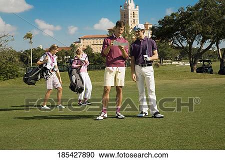 Four friends discussing in a golf course, Biltmore Golf Course, Coral Gables, Florida, USA View Large Photo Image Stock Image - Four friends discussing in a golf course, Biltmore Golf Course, Coral Gables, Florida, USA. Fotosearch