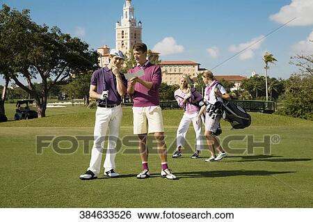 Four friends discussing in a golf course, Biltmore Golf Course, Coral Gables, Florida, USA View Large Photo Image Stock Photograph - Four friends discussing in a golf course, Biltmore Golf Course, Coral Gables, Florida, USA. Fotosearch