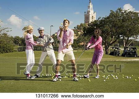 Four friends having fun in a golf course, Biltmore Golf Course, Biltmore Hotel, Coral Gables, Florida, USA View Large Photo Image Stock Photograph - Four friends having fun in a golf course, Biltmore Golf Course, Biltmore Hotel, Coral Gables, Florida, USA. Fotosearch